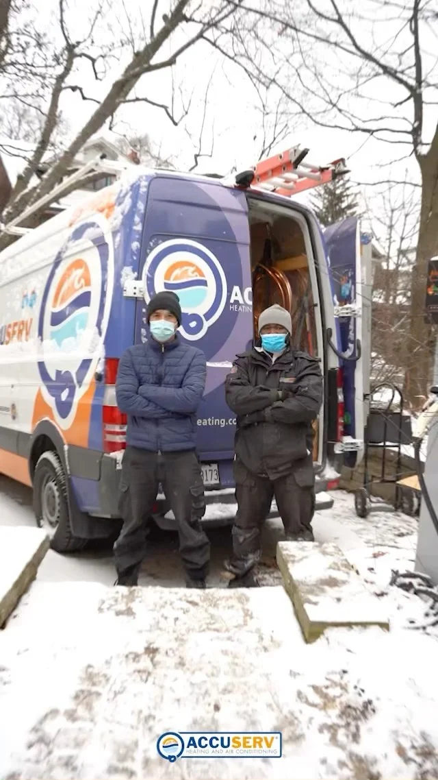 AccuServ team beside its service van, still from its boiler-installation video.
