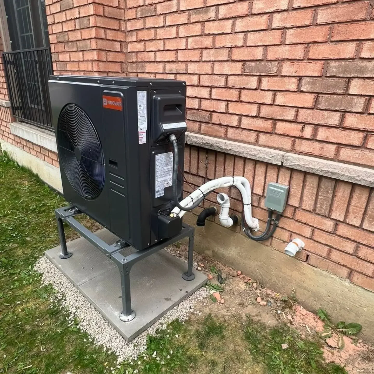 Cozy Castle Moovair outdoor heat-pump installation.