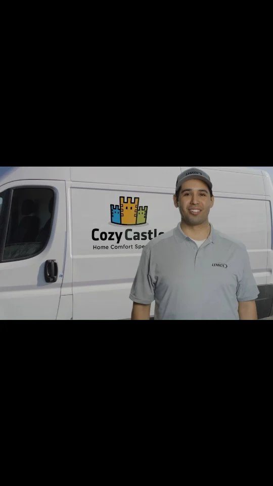 Cozy Castle representative beside its company van, still from its video.