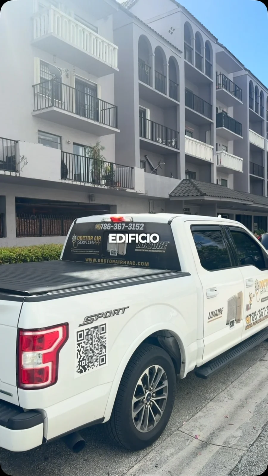 Doctor Air branded pickup at an HVAC relocation job — Instagram video still.