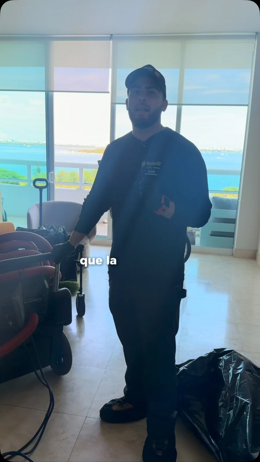 Doctor Air technician during an indoor service visit — Instagram video still.