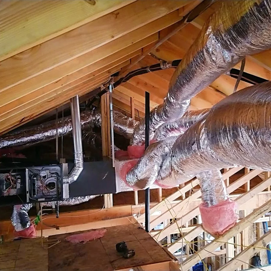 Furnace, evaporator coil and attic ductwork installed by LC Heating and Air.