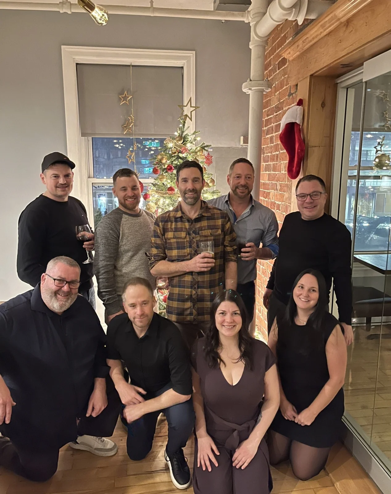 Rick Menard team at the company holiday gathering.