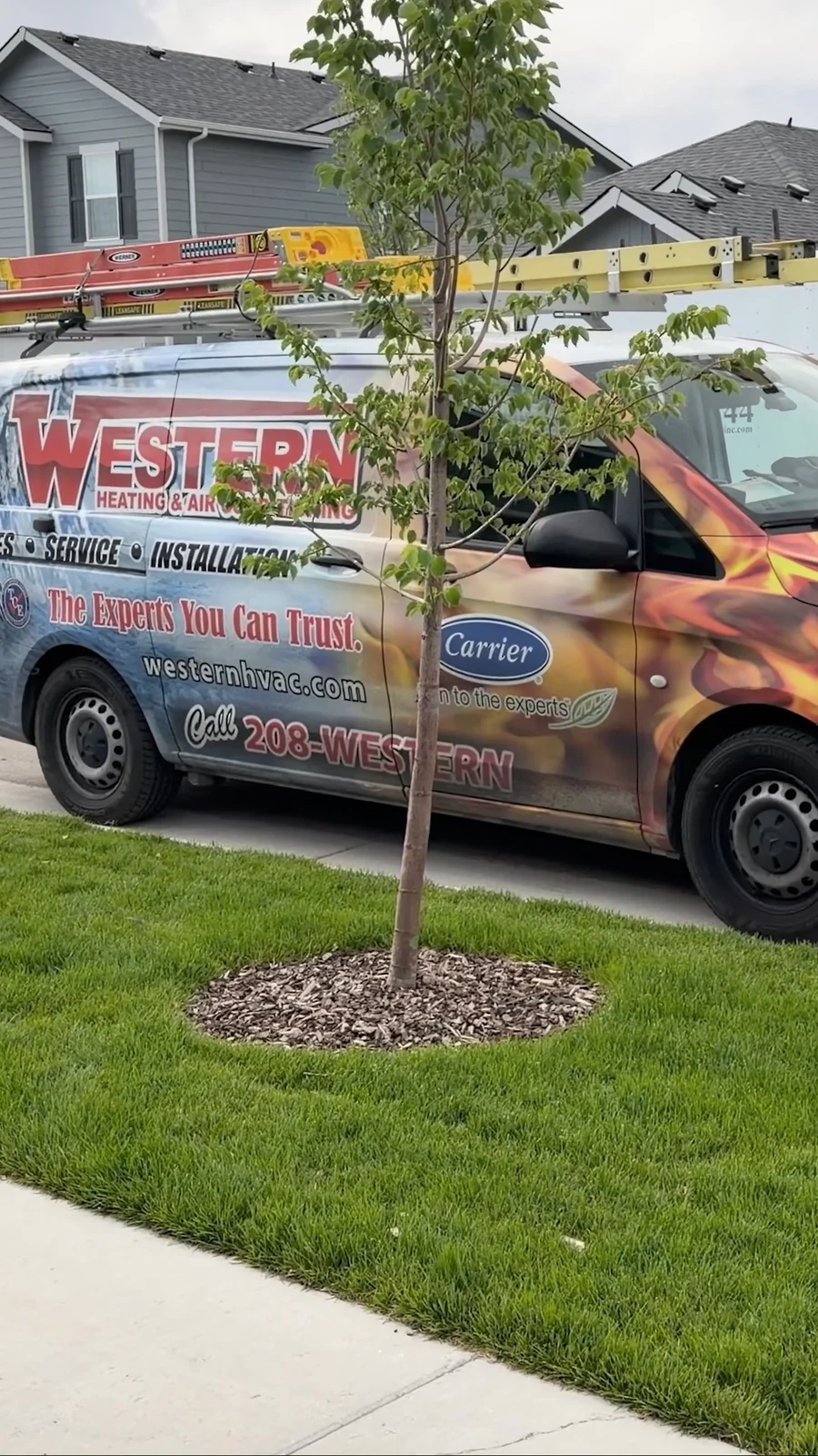 Western service van outside a property (Instagram video still)
