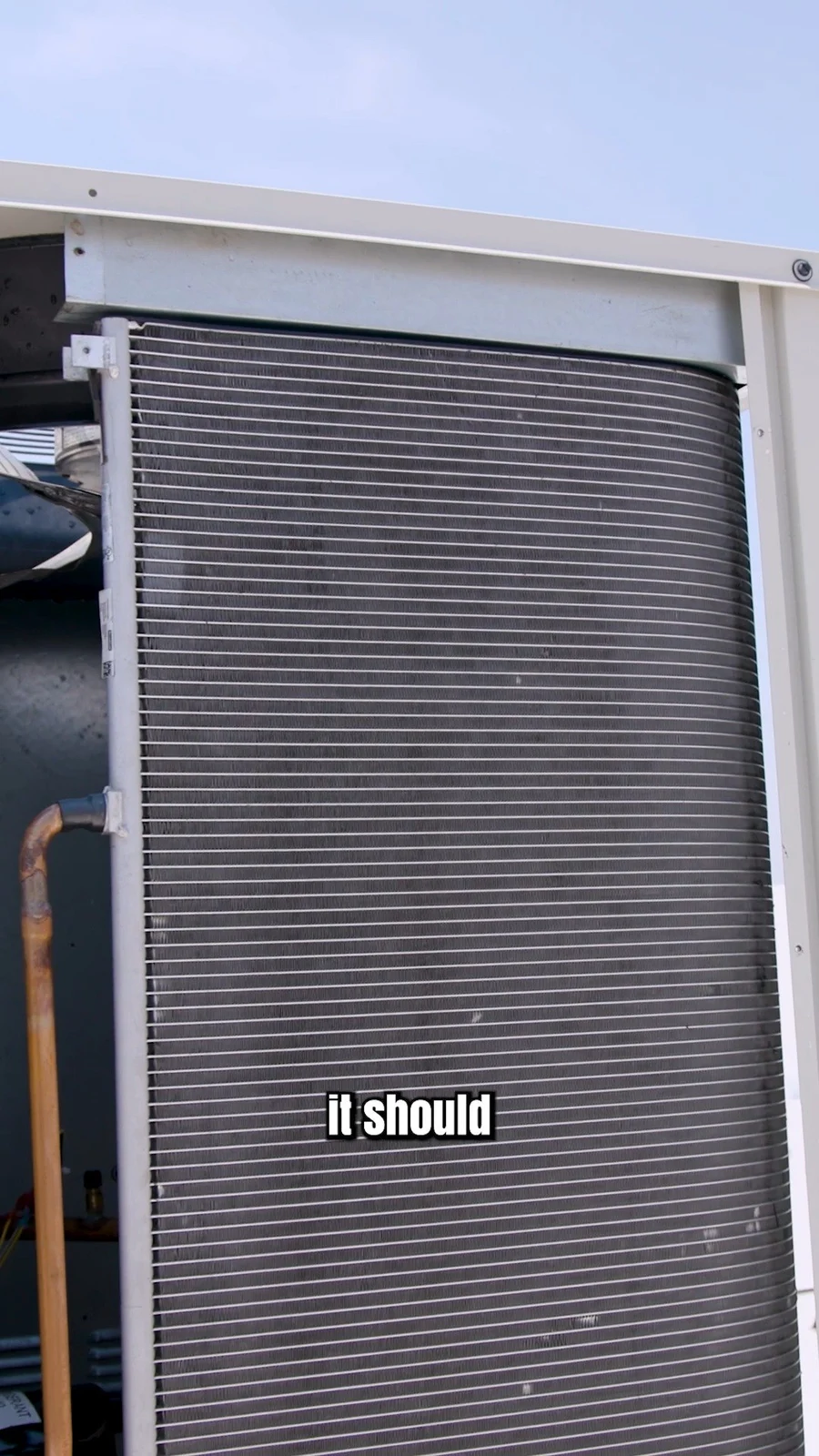 Western commercial HVAC technician servicing equipment (Instagram video still)
